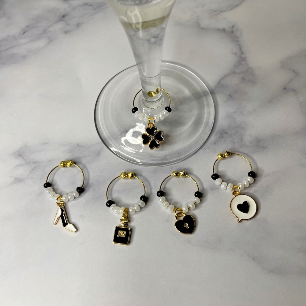 Black, white and gold wine charms